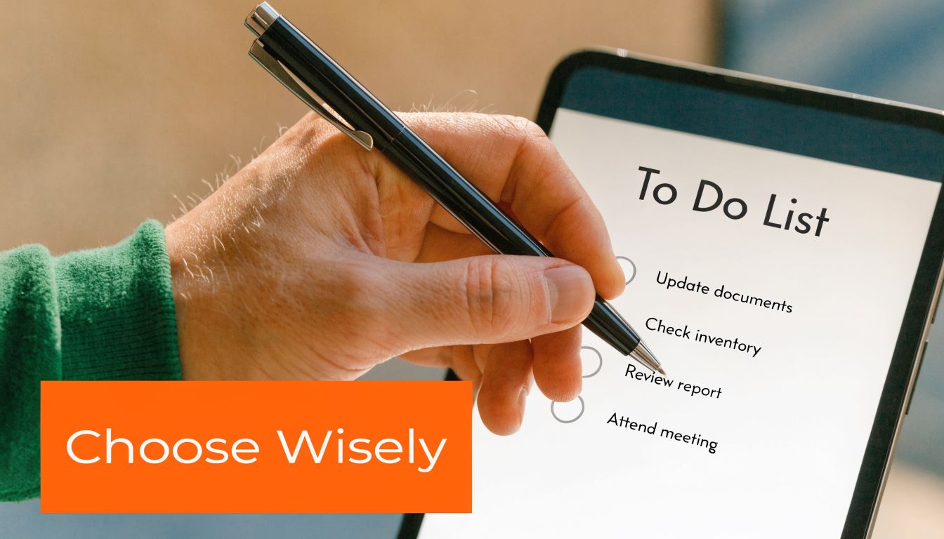 A close-up view of a hand holding a pen over a digital tablet showing a to-do list.